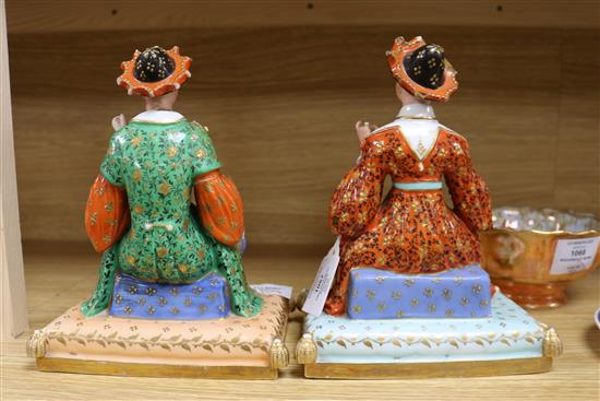 A pair of Paris area figures of a Chinaman and Chinawoman, with detachable heads